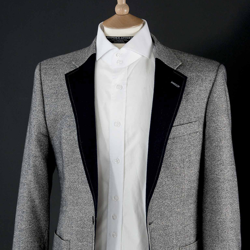 Grey Cashmere Birdseye Blazer with contrasting Navy Blue Herringbone Lapel and Pocket Insert photo